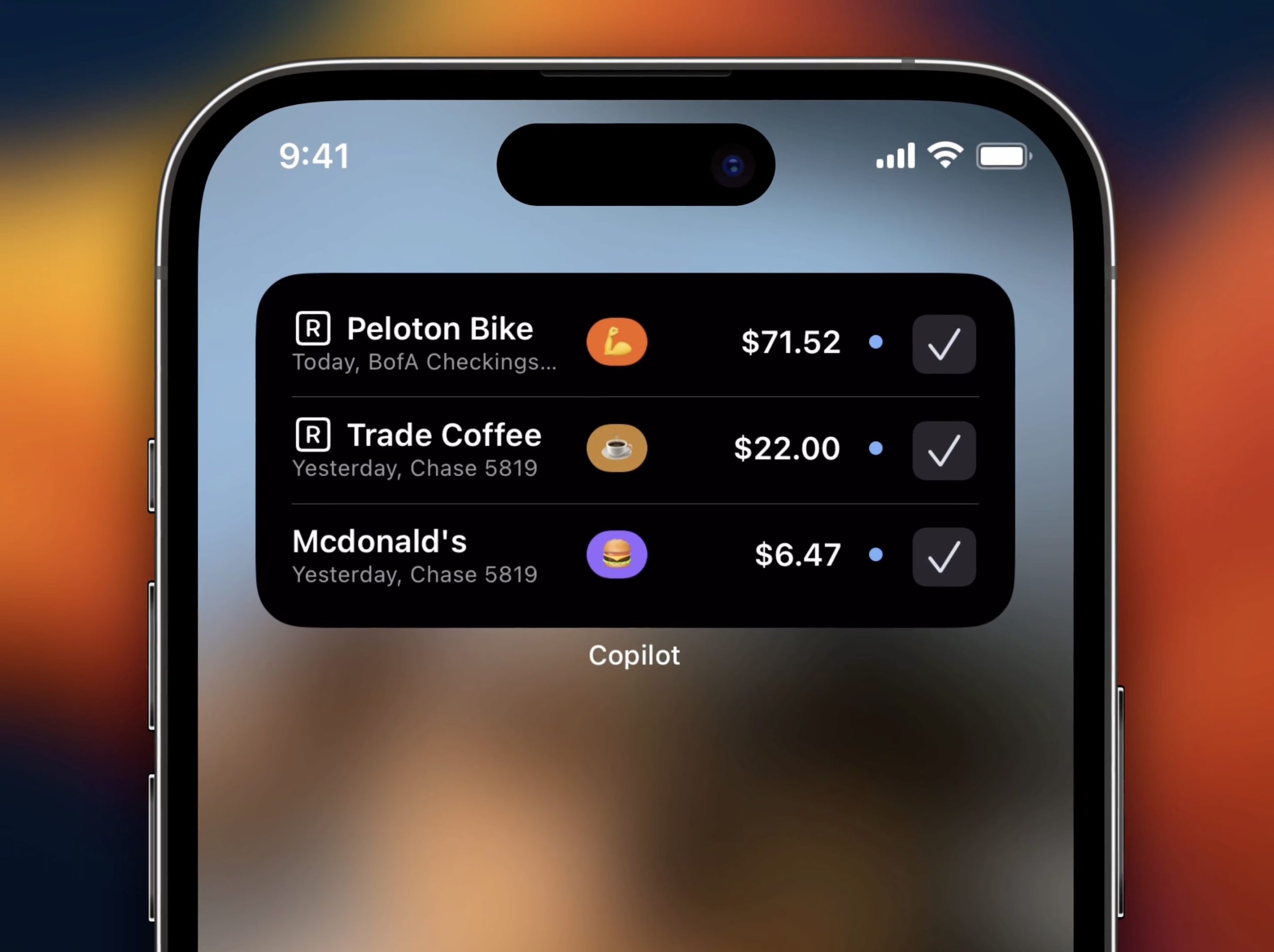 A smartphone screen displays a banking app with three recent transactions: $71.52 for Peloton Bike, $22.00 for Trade Coffee, and $6.47 for McDonald's. Each entry shows an icon, payment method, and a checkmark indicating the transaction is complete—perhaps fueling some motivation in the Apple Fitness vs Peloton debate.