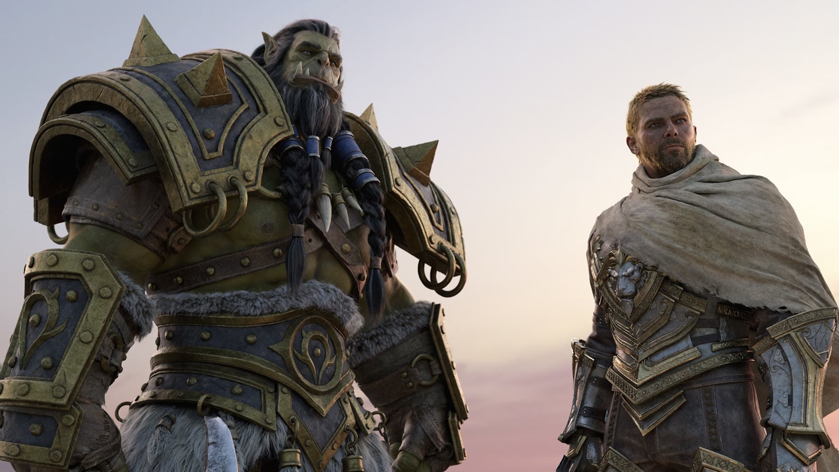 Two fantasy characters are depicted, one a large armored orc with tusks and a beard, wearing spiked armor adorned with bones, and the other a human with short blonde hair in ornate, golden armor and a light-colored cloak. The background shows a twilight sky, hinting at the new World of Warcraft expansion: The War Within.