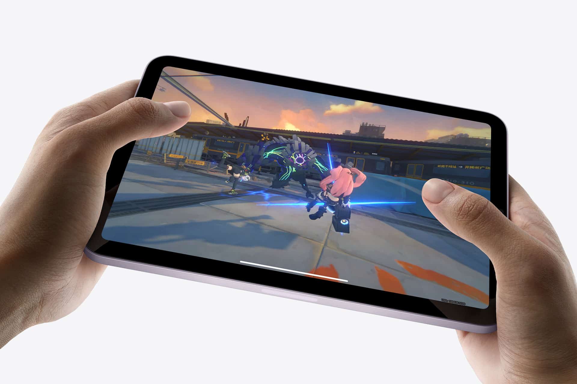 Apple iPad mini displaying a video game with colorful, animated characters on a train station platform. The screen shows vibrant graphics and dynamic action under a bright blue sky.