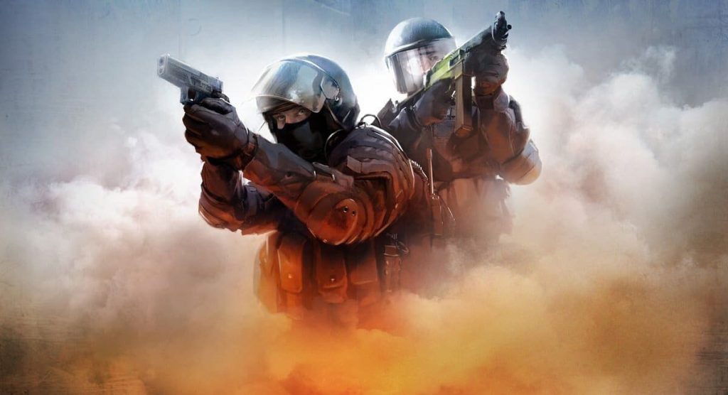 Amidst a smoky, intense battlefield, two heavily armored soldiers in tactical gear focus intently. One grips a pistol while the other wields a shotgun. It feels like an action-packed scene straight out of Counter-Strike, where every move counts in this high-stakes game of skill and precision.