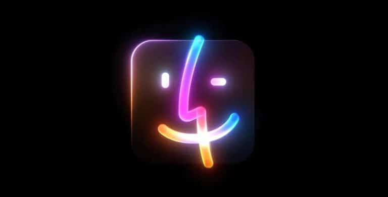 A colorful neon logo resembling a stylized face with a smile, featuring a curvy line for the nose and mouth, set on a dark background. The colors include bright shades of blue, pink, yellow, and orange.