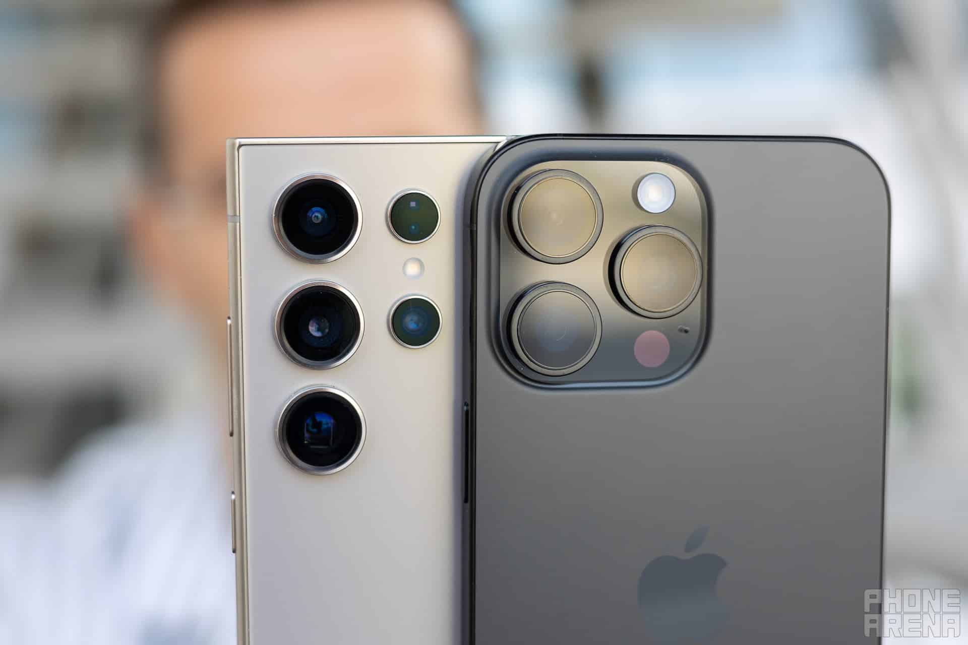 iPhone 16 Pro Max and Samsung Galaxy S24 side by side, showcasing their advanced camera capabilities in a detailed comparison | Image: PhoneArena | iPhone 16 Pro Models