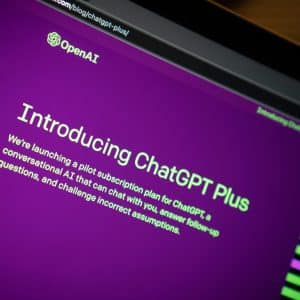 A computer screen showcasing a webpage with a purple background and text that reads, "Introducing ChatGPT Plus" for enhanced coding productivity. The OpenAI logo is prominently visible at the top left corner.