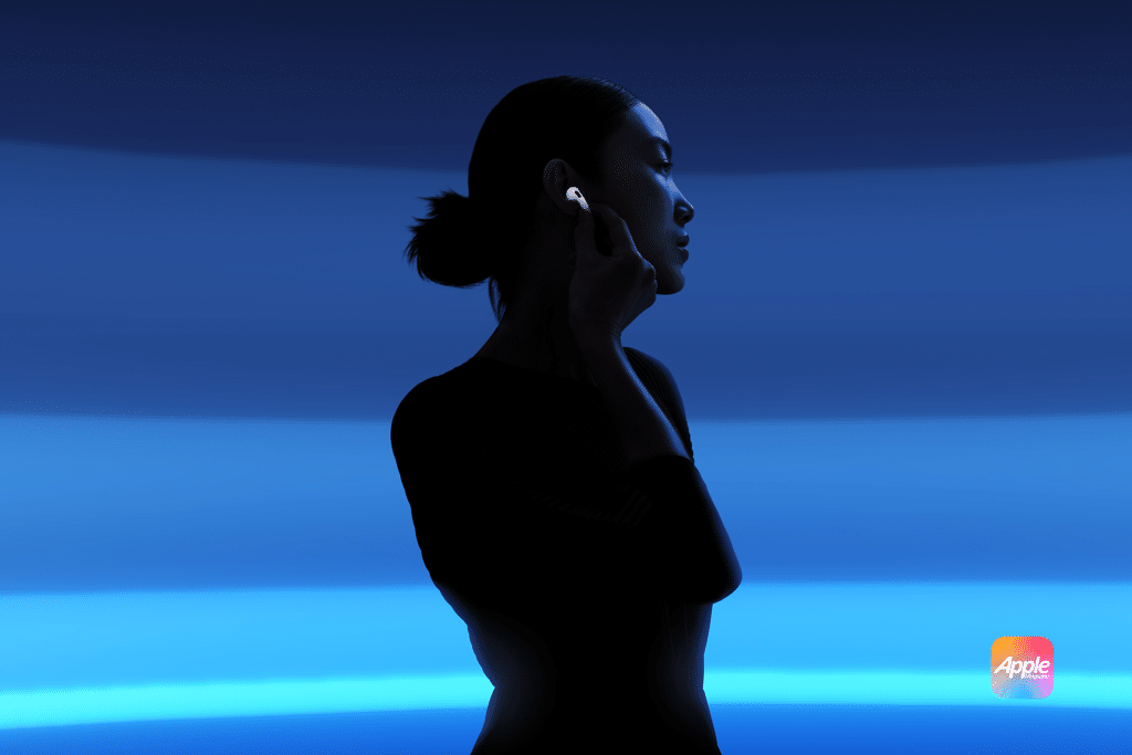 A silhouette of a person with a bun wearing earbuds, possibly AirPods with tiny cameras, touches one ear. The background features a gradient of blue horizontal stripes, while the Apple logo graces the lower-right corner.