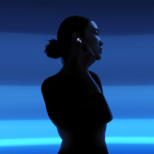 A silhouette of a person with a bun wearing earbuds, possibly AirPods with tiny cameras, touches one ear. The background features a gradient of blue horizontal stripes, while the Apple logo graces the lower-right corner.