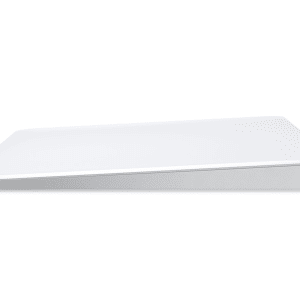 Side view of a sleek, white Magic Trackpad with a slightly angled design, set against a plain white background. A small, colorful Apple logo graces the lower right corner.