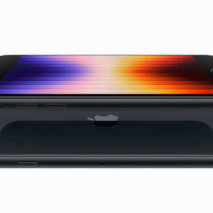 A smartphone, rumored to be the iPhone 16E, boasts a vibrant, colorful screen display shown from the side and back. It features a sleek black design, a camera, and a home button.