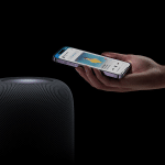 Concept render of the Apple HomePod 2025 with a 6-7 inch screen displaying a smart home control interface, featuring an A18 chip-powered design on a modern kitchen counter.