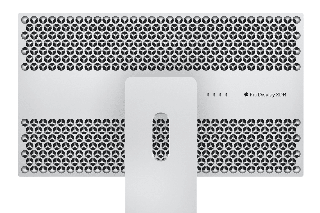 Back view of an Apple Pro Display XDR 2, showcasing its distinct lattice ventilation pattern and sleek, minimalist stand. The stand features a rectangular opening, with the Apple logo and "Pro Display XDR" text prominently displayed on the top right.