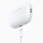 A white wireless earbud charging case, reminiscent of the AirPods Pro 3 features, is set against a pristine backdrop. It boasts a small indicator light, a charging port at the bottom, and an attached USB-C cable for seamless power-ups.