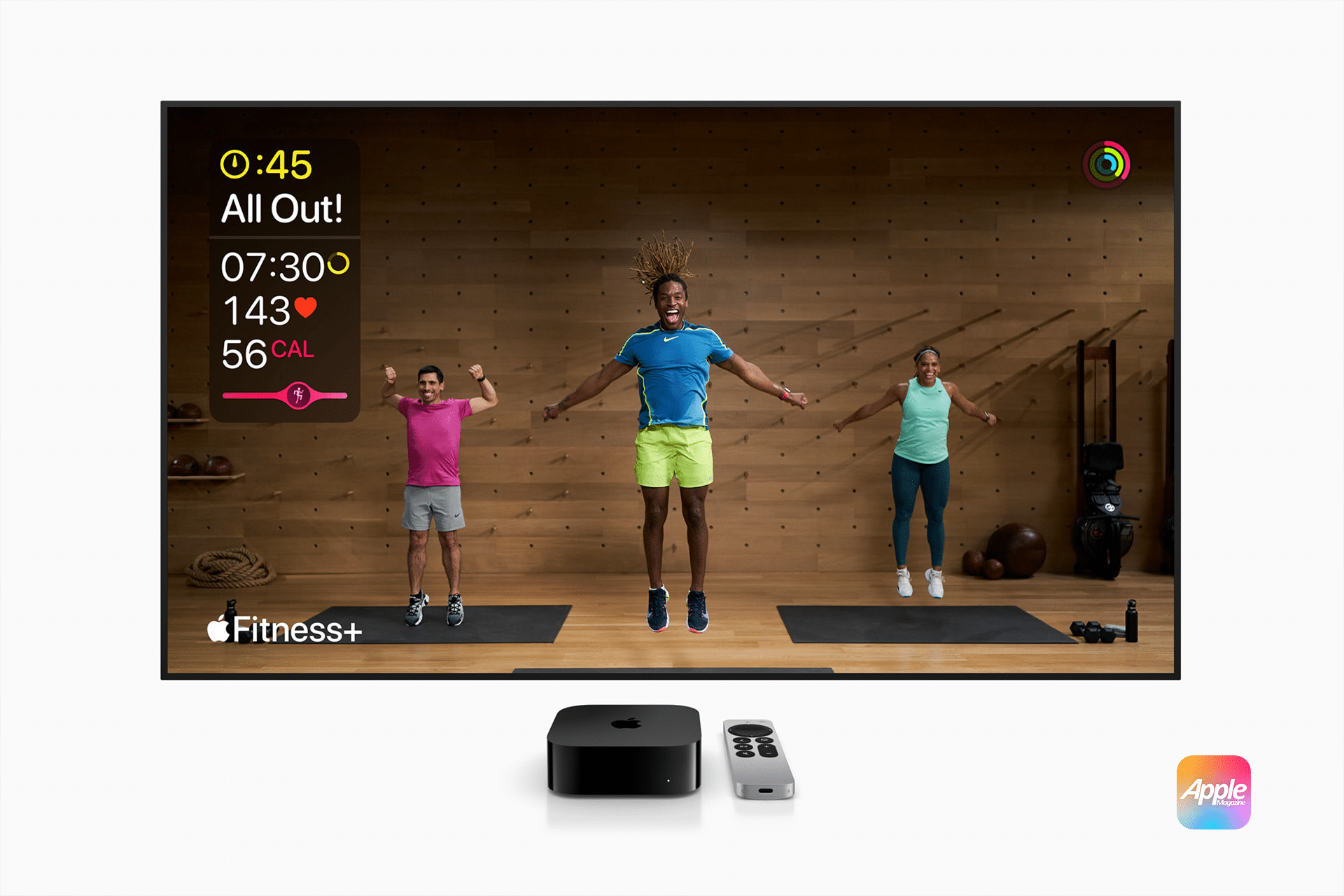 Three people are exercising indoors in front of a wooden wall, displayed on an Apple TV 2025's large screen. Fitness stats appear on the left. At the bottom, there is an Apple TV device and remote, with the Apple Fitness+ logo featured prominently on the right.