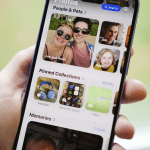 iPhone screen displaying the Photos app with AirDrop enabled, transferring photos wirelessly to a Mac, showcasing iCloud Photos and AirDrop for seamless media sharing.