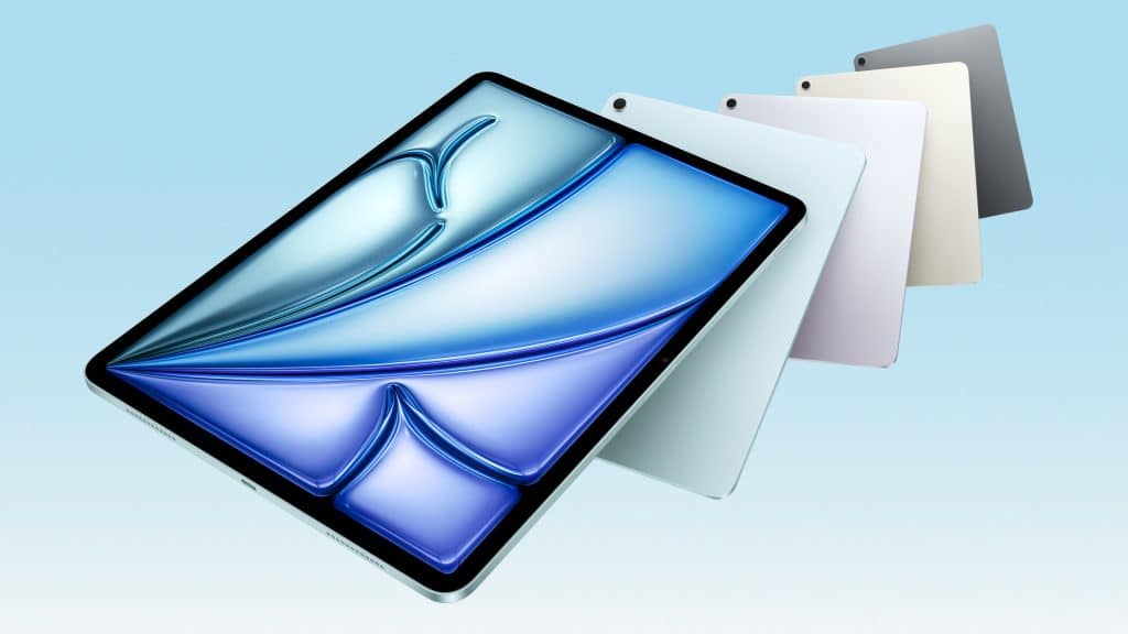 A tablet with a blue, abstract wave design on the screen is displayed at an angle. Behind it, four tablets in different colors are fanned out against a light blue background.