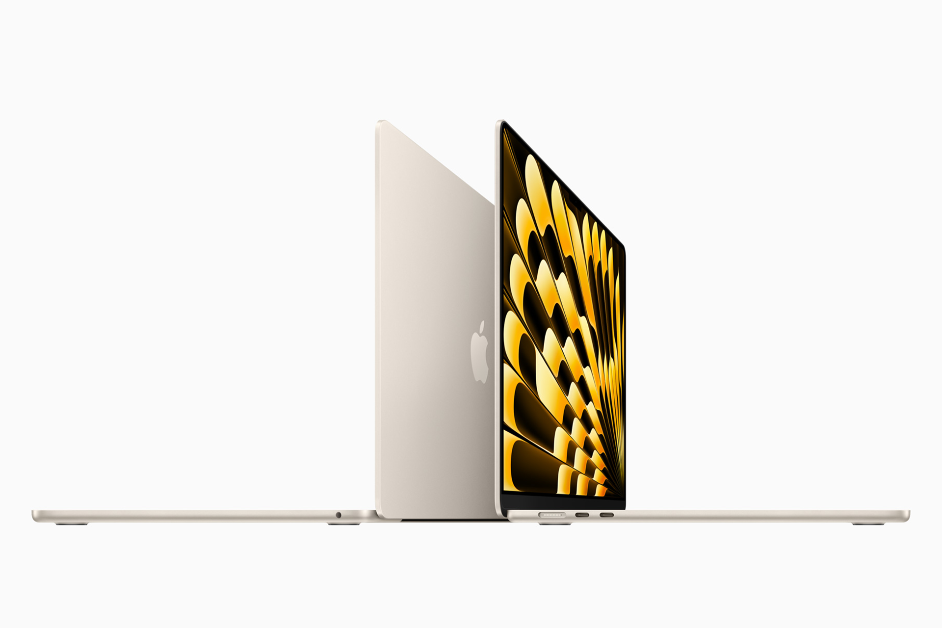 A gold-colored MacBook Air M4 with a sleek design is shown open at a side angle. The screen displays an abstract, geometric pattern in shades of gold and black, perfectly highlighting the latest announcement. The Apple logo stands proud on the back of the screen.