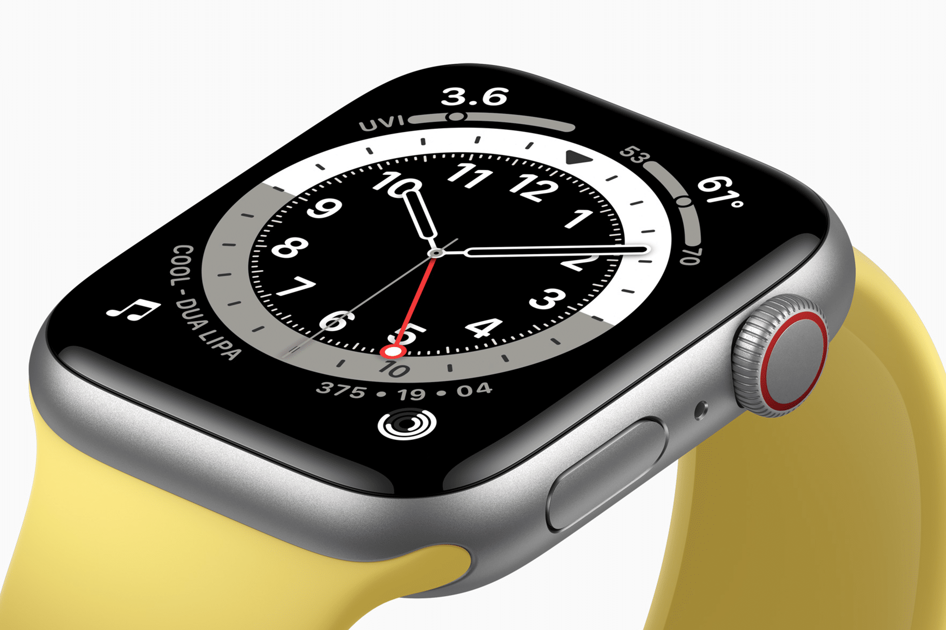A close-up of an Apple Watch SE 3 with a yellow band displays an analog clock face, weather info, UV index, battery percentage, and a music track by Dua Lipa. The watch is shown at an angle against a white background.