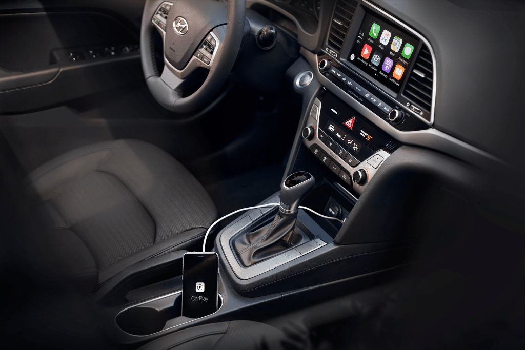 Apple CarPlay EV support enhances electric vehicle navigation with battery tracking and charger suggestions, currently limited to Ford and Porsche models.