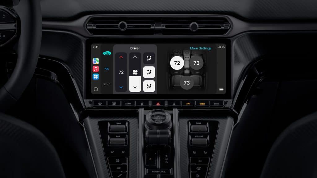 Close-up of a car's digital dashboard touchscreen displaying climate control settings alongside Apple Maps integration. The sleek, black interior highlights advanced features like temperature adjustment, fan speed, air direction, and seat A/C options.