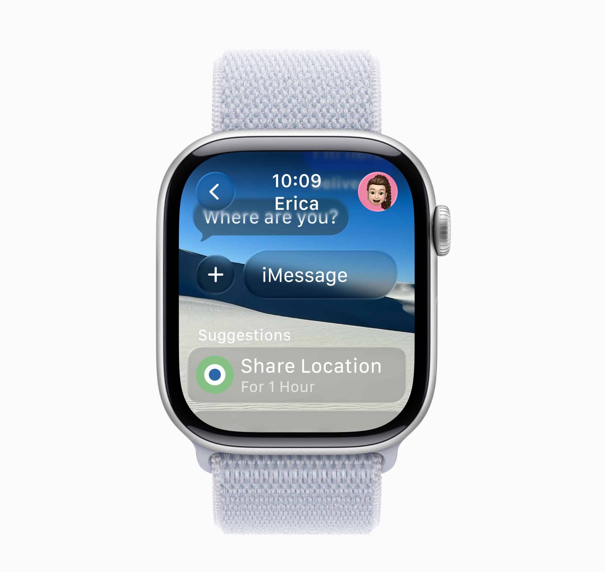Apple Watch running watchOS 26 displays an iMessage with Erica—"Where are you?"—and options to share your location for 1 hour, all set against a backdrop of serene sand dunes.
