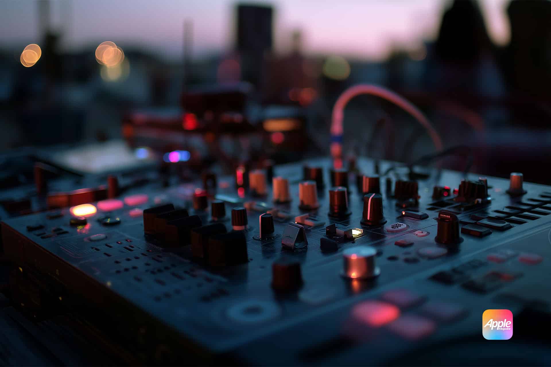 A close-up of a DJ mixer with glowing buttons and knobs, taken at dusk with blurred lights and silhouettes in the background. The vibrant scene highlights the Apple Music logo and suggests the seamless mixing possible with Apple AutoMix features.