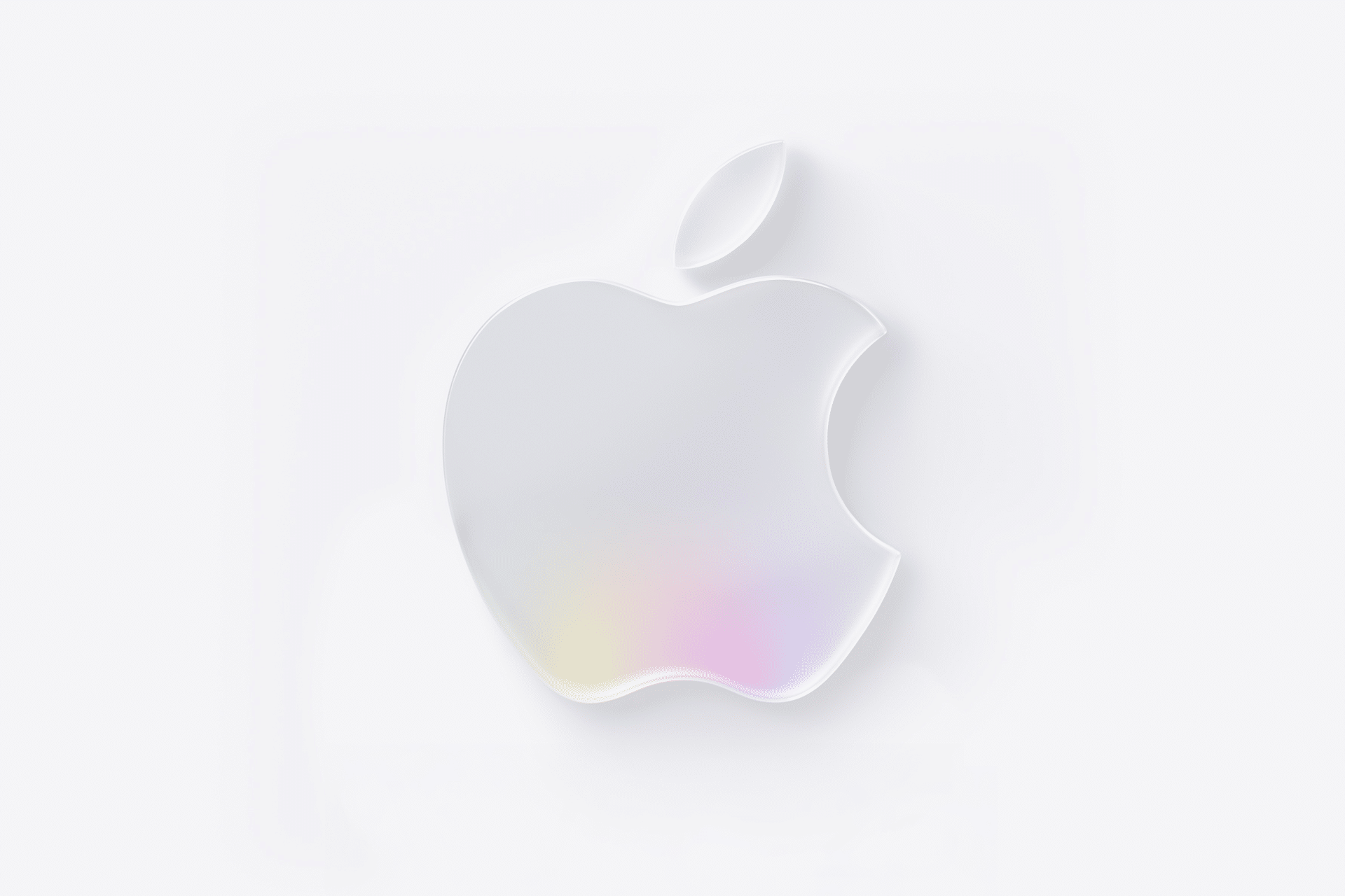 A white Apple logo with a subtle, soft rainbow-colored gradient at the bottom, set against a light gray background—perfect for highlighting Apple Q3 2025 earnings updates.