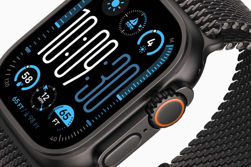 Close-up of a black Apple Watch Ultra 3 with a mesh band displaying the time (10:09:30), various health and activity metrics, and an orange ring around the side button. Stay connected with 5G and satellite features on its vibrant digital screen.
