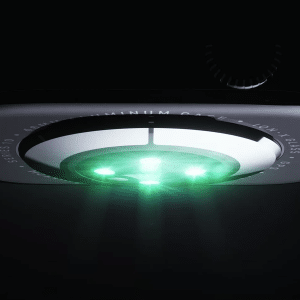 Close-up of the underside of an Apple Watch with green sensor lights illuminated, highlighting the device's blood oxygen monitoring sensors and part of the engraved text around its circular sensor area.