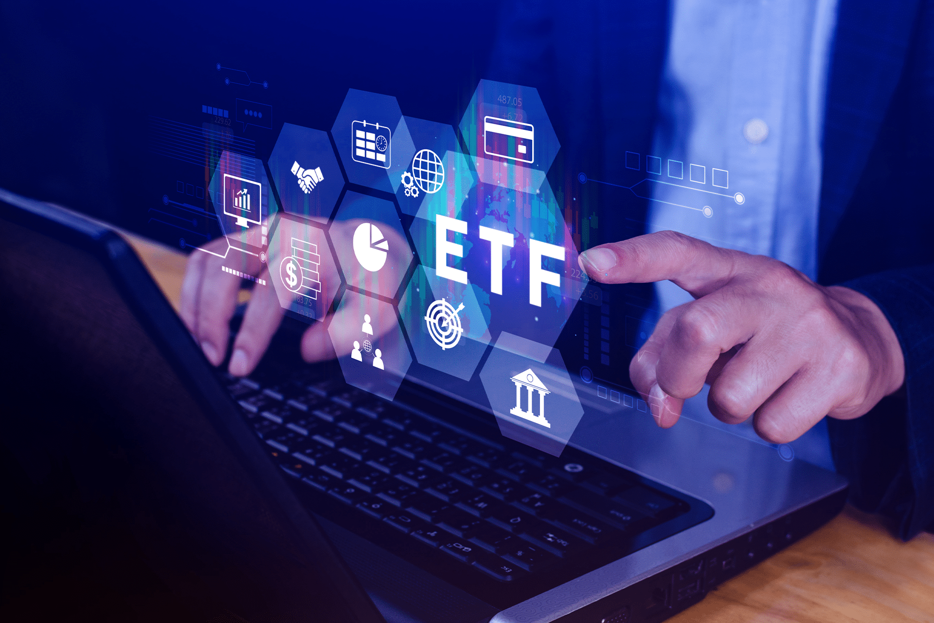 A person using a laptop with virtual icons displaying financial symbols and the letters "ETF," highlighting how ETFs and AI technologies like NVIDIA are shaping the future of investing.