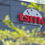 A close-up of a computer screen, reflecting the impact of US chip tariffs and Arizona investments on TSMC's latest operations.