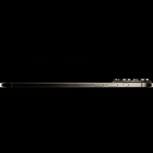 A side view of the iPhone 17 Air against a black background, highlighting its innovative design, impressive thinness, sleek profile, buttons, and raised rear camera bump.