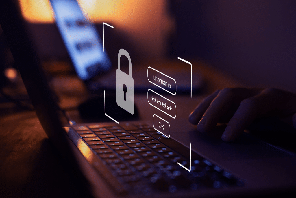 A person using a laptop with a digital overlay showing a padlock icon and login fields for username and password, highlighting cybersecurity risks and the importance of data protection against any potential security flaw.