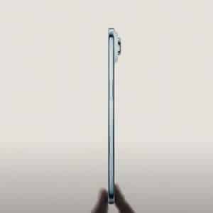 A hand holds a thin tablet vertically, shown from the side. The word "AIR" is split, with "A" on the left and "R" on the right, highlighting the iPhone Air's premium design and Apple’s thinnest smartphone profile.