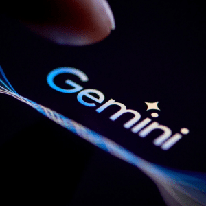 The word "Gemini" appears in glowing blue and white text on a dark screen, with colorful wave lines extending from the left, hinting at Google Gemini AI updates, and a finger visible at the top edge.