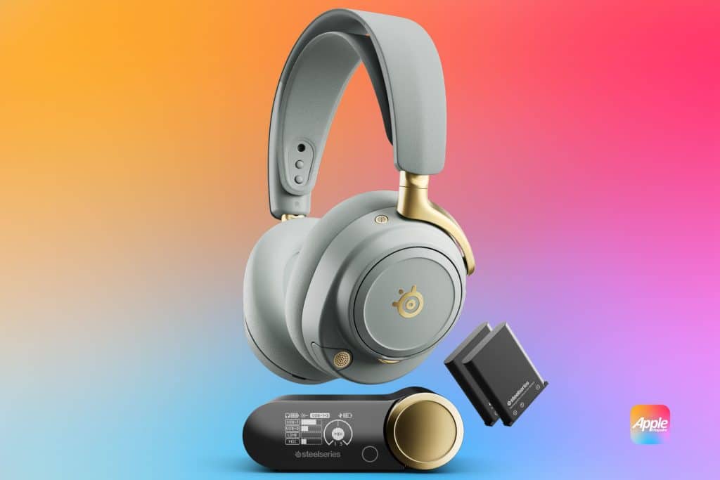 SteelSeries Arctis Nova Elite gaming headset. Gray and gold SteelSeries Arctis Nova Elite wireless headphones with a detachable microphone, wireless transmitter, and battery pack are shown on a colorful gradient background. Designed for gaming, they deliver high-end sound. An Apple logo is in the bottom right corner.