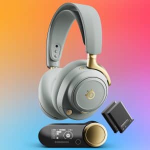 SteelSeries Arctis Nova Elite gaming headset. Gray and gold SteelSeries Arctis Nova Elite wireless headphones with a detachable microphone, wireless transmitter, and battery pack are shown on a colorful gradient background. Designed for gaming, they deliver high-end sound. An Apple logo is in the bottom right corner.
