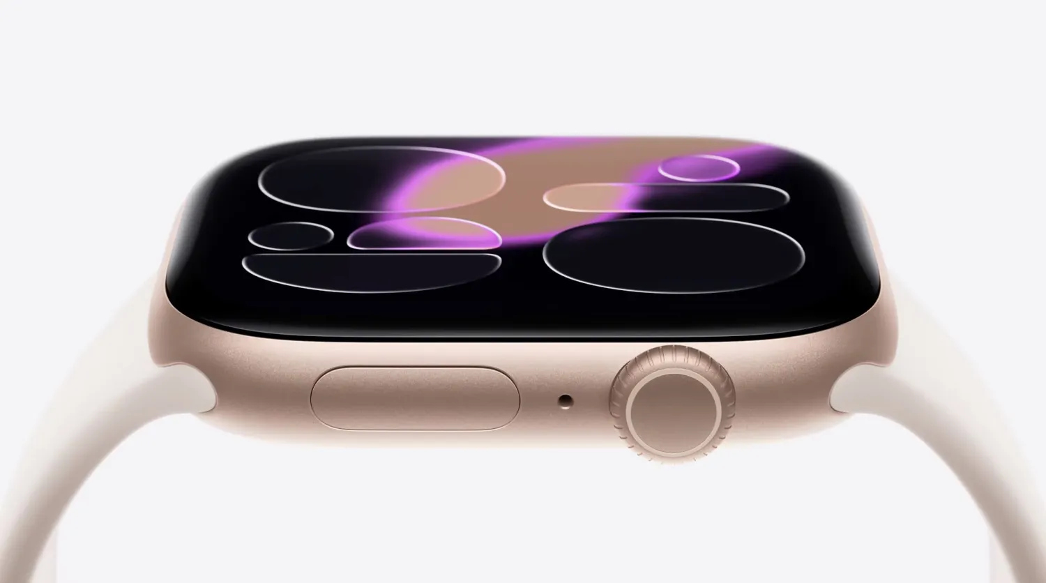 A close-up side view of a gold Apple Watch Series 11 with a light band, displaying a modern, abstract watch face with purple and beige circular patterns—highlighting the device’s advanced features like the Hypertension Monitor.