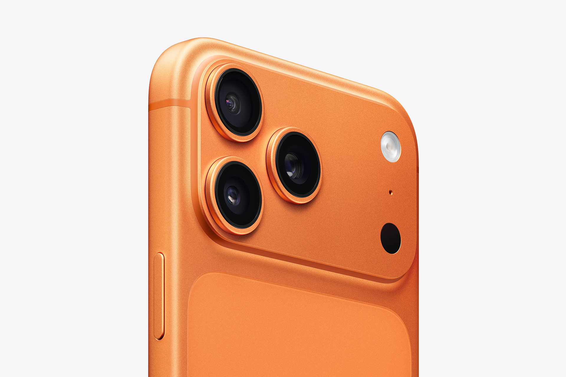 Close-up of the back panel of an orange iPhone 18 Pro featuring three camera lenses, an LED flash, and additional sensors against a light background.