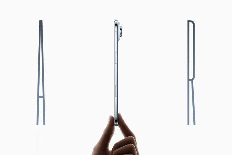A hand holds a slim iPhone Air vertically against a white background. Large, thin letters "A" on the left and "R" on the right frame the phone, highlighting its thin profile and key differences from previous models.