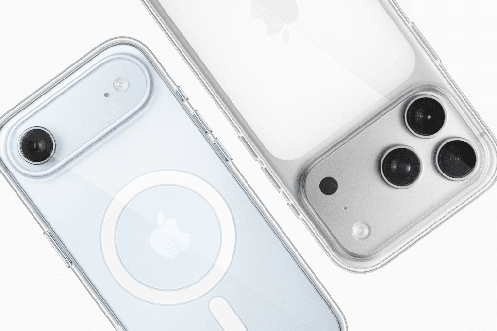 Close-up of the backs of two smartphones in white cases, highlighting key differences: one resembles the iPhone Air with a single camera and MagSafe design, while the other, likely an iPhone 17 Pro, features three cameras and a flash. Both show Apple logos.
