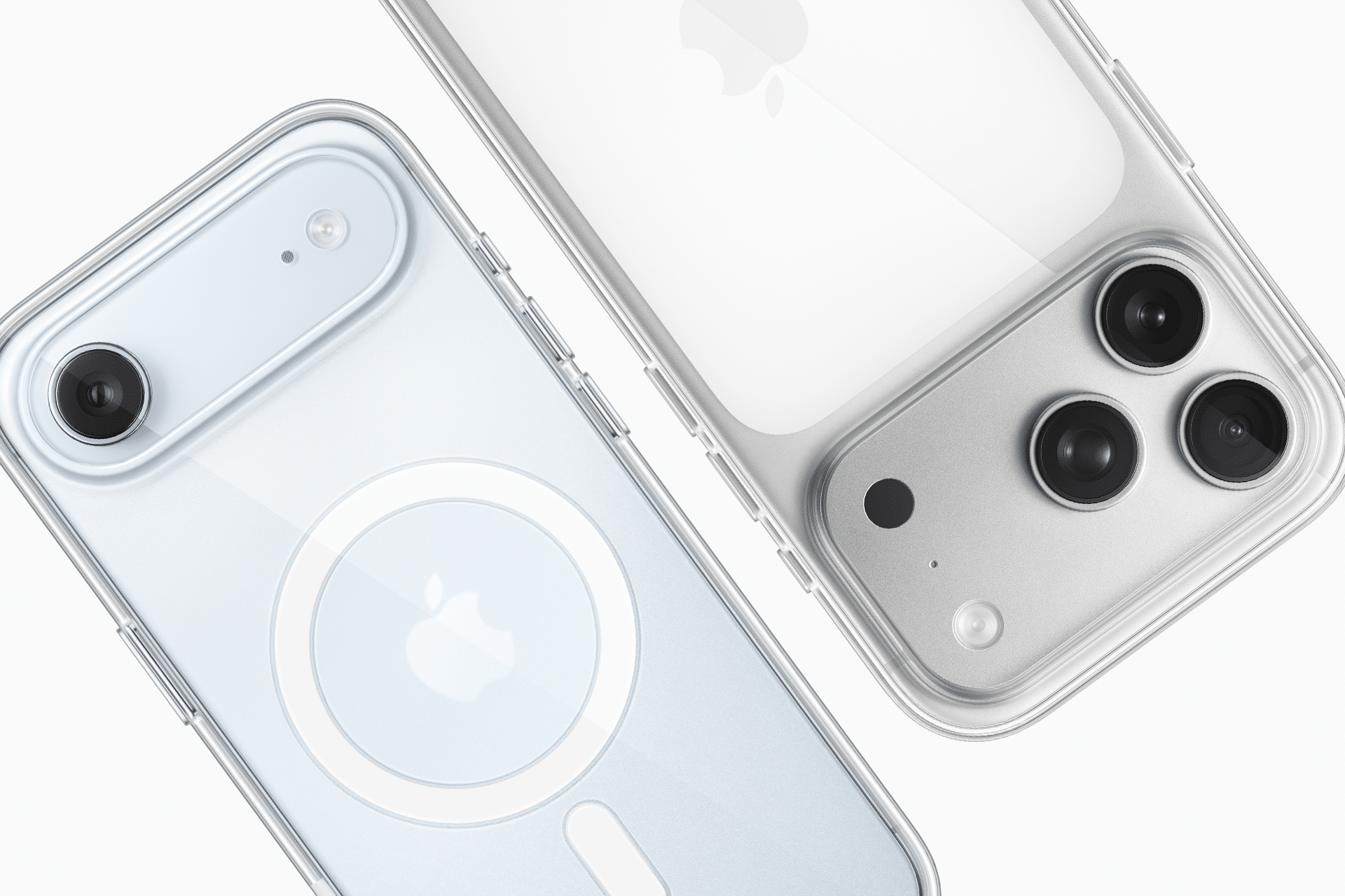 Close-up of the backs of two smartphones in white cases, highlighting key differences: one resembles the iPhone Air with a single camera and MagSafe design, while the other, likely an iPhone 17 Pro, features three cameras and a flash. Both show Apple logos.
