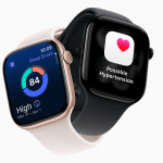 Two smartwatches display health apps; one, resembling an Apple Watch, shows a sleep score of 84 with sleep data, while the other displays a heart icon and the alert “Possible Hypertension,” demonstrating helpful Hypertension Alerts. The bands are white and black.