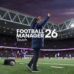 A football manager celebrates with raised arms on the sidelines of a packed stadium at dusk. The text "Football Manager 26 Touch" appears in the center of the image.
