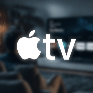 A person sits on a couch in a dimly lit living room, watching a large TV screen. The Apple TV+ becomes Apple TV logo is prominently displayed in the foreground, overlaying the scene.