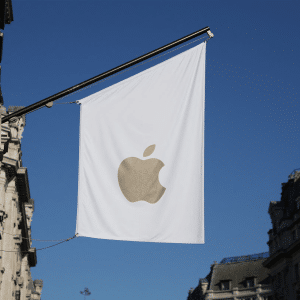 A white flag with a gold Apple logo hangs outside a building, set against a clear blue sky and surrounded by historic stone architecture, symbolizing the presence of UK Apple and its dedication to protecting encrypted iPhones.
