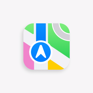Apple Maps ads 2026 app icon featuring a stylized map with colorful sections in green, yellow, pink, white, and gray, a bold blue road, and a blue circle with a white arrow in the center.