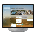 A tablet on a smart speaker displays a smart home control dashboard, showing security camera feeds, lighting and temperature controls, and automation options—now seamlessly integrating with the iPhone 18 Pro camera upgrade for enhanced visuals.