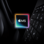 A glowing Apple M5 chip logo appears at the center, surrounded by dark shadows, hinting at impressive M5 chip performance, with part of a MacBook keyboard and a sleek Apple device visible in the background.