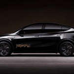 A sleek black electric SUV with tinted windows and a bold gold "REKTAN" logo on the driver’s door, parked in a dimly lit space—evoking the futuristic vibe of a Waymo vs Tesla robotaxi showdown.