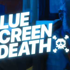A large glowing text reads "BLUE SCREEN OF DEATH" with a pixelated skull icon; a person in glasses and a jacket appears blurred against a blue-tinted background, reminiscent of The Underdogs Apple short film's quirky tech moments.