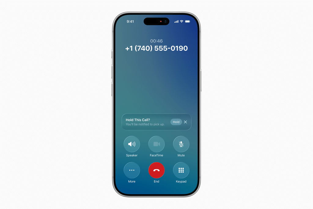 An iPhone screen showing an active call with the number +1 (740) 555-0190. The call timer reads 00:46, and options like Speaker, FaceTime, and iOS 26 spam call blocker features are visible alongside Mute, Keypad, More, Hold, and End.