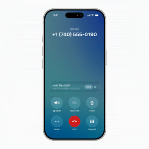An iPhone screen showing an active call with the number +1 (740) 555-0190. The call timer reads 00:46, and options like Speaker, FaceTime, and iOS 26 spam call blocker features are visible alongside Mute, Keypad, More, Hold, and End.